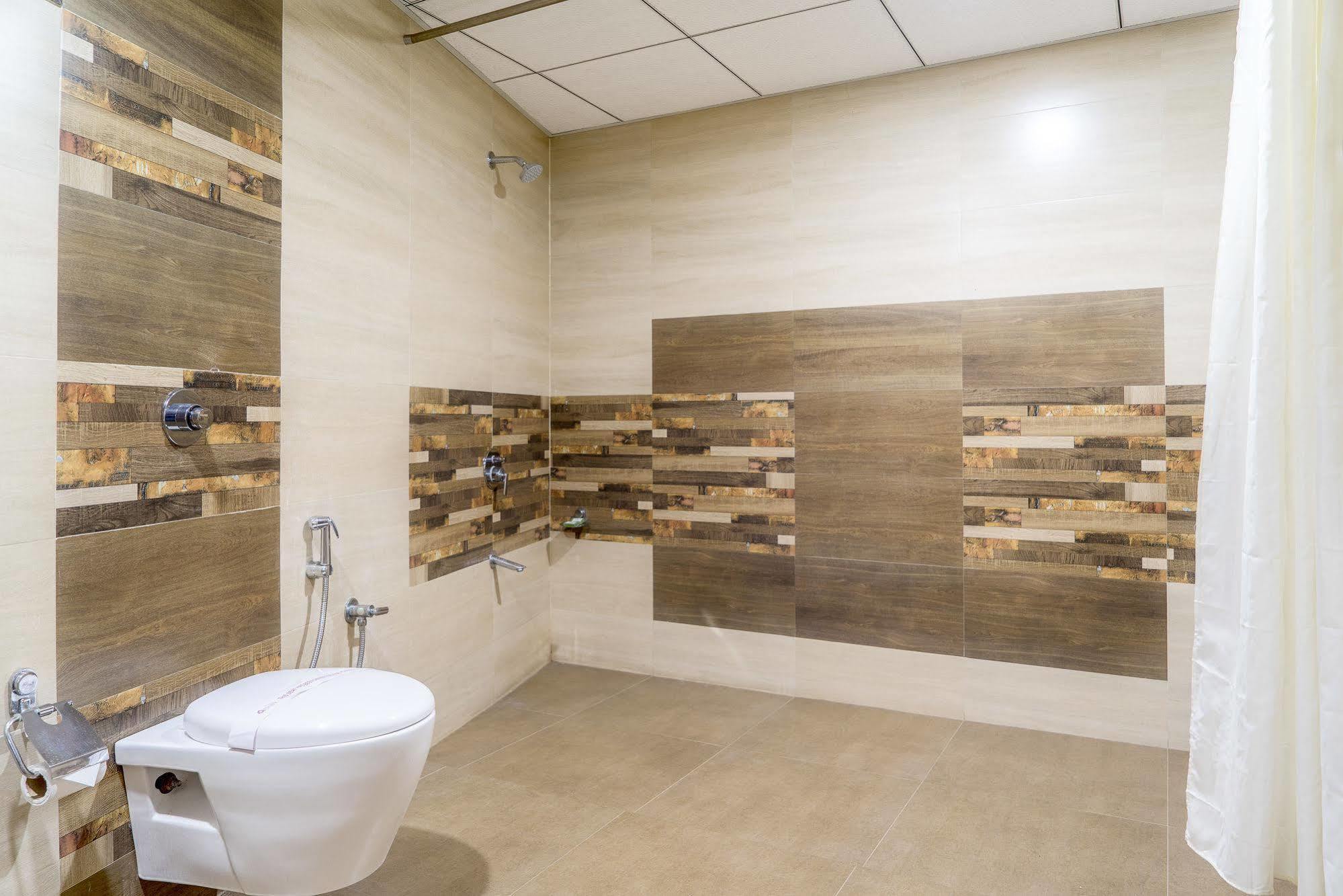 Treebo Unity Hotel Ahmadábád Kültér fotó